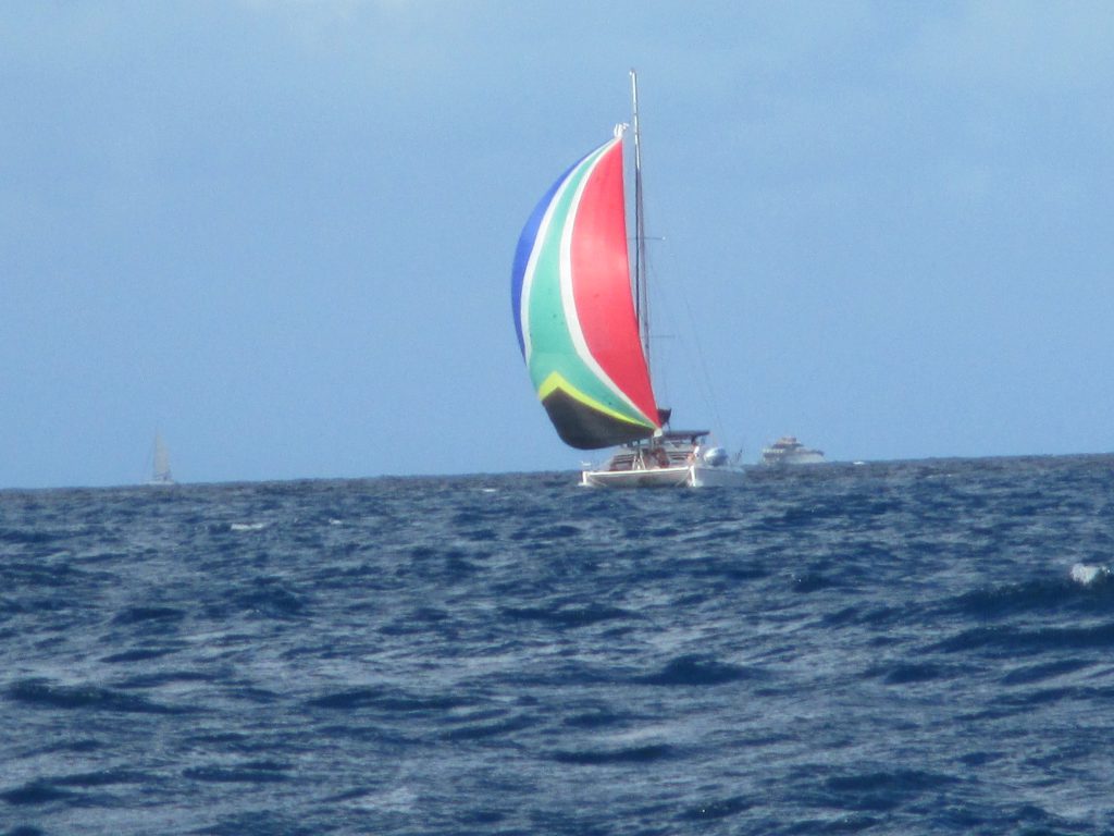 Madiba's spinnaker displays the colors of South Africa's flag