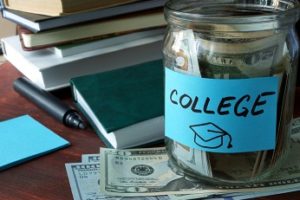 Jar with label college and money.