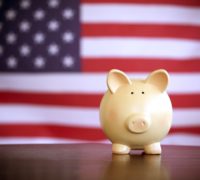 piggy bank on an American flag